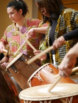 Students playing drums