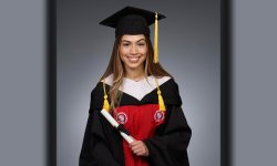 photo of Brianna Correa in graduation regalia
