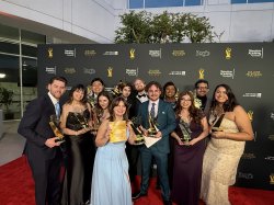 Students posing with awards at the 45th College Television Awards in North Hollywood, California.