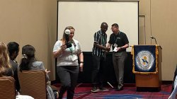 Odera Umeh receives the NJWEA presentation Award