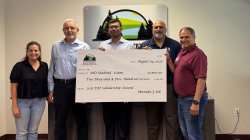 Md Shahnul Islam receiving a check as part of his 2025 ERI Scholarship Award