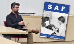 Photo of Jeff Gonzalez with cover of SAF