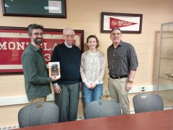 Left to right: Professor Jeffrey Gonzalez, Leon Zimmerman '59, Camille Zimmerman '27 (Leon's granddaughter), Archivist Paul Martinez