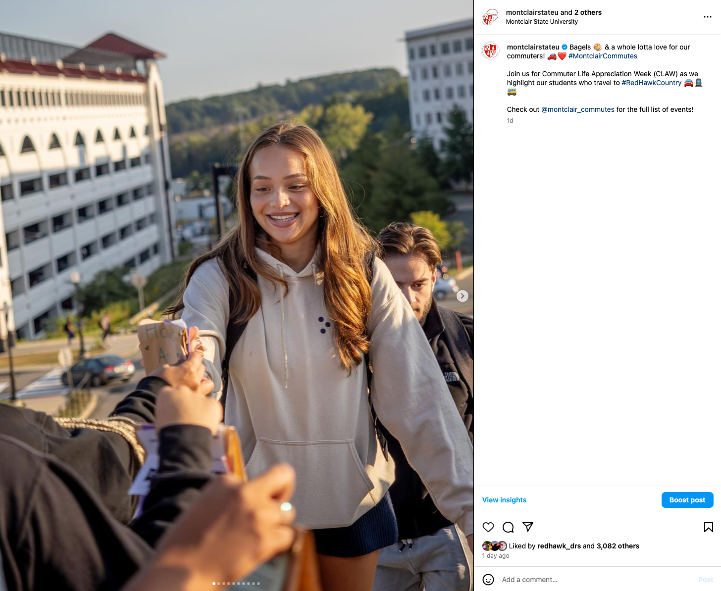 Student receiving a bagel.