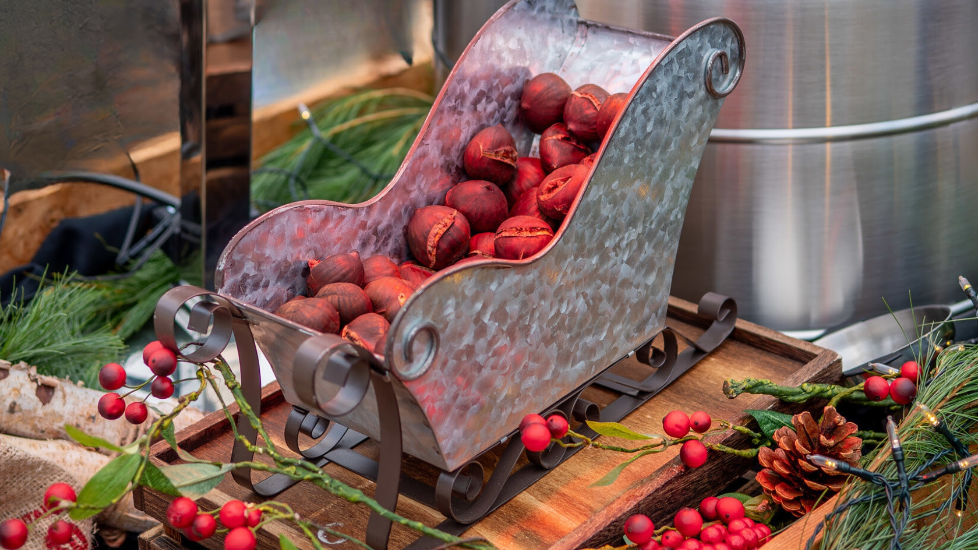 Decorative sled with chestnuts inside.