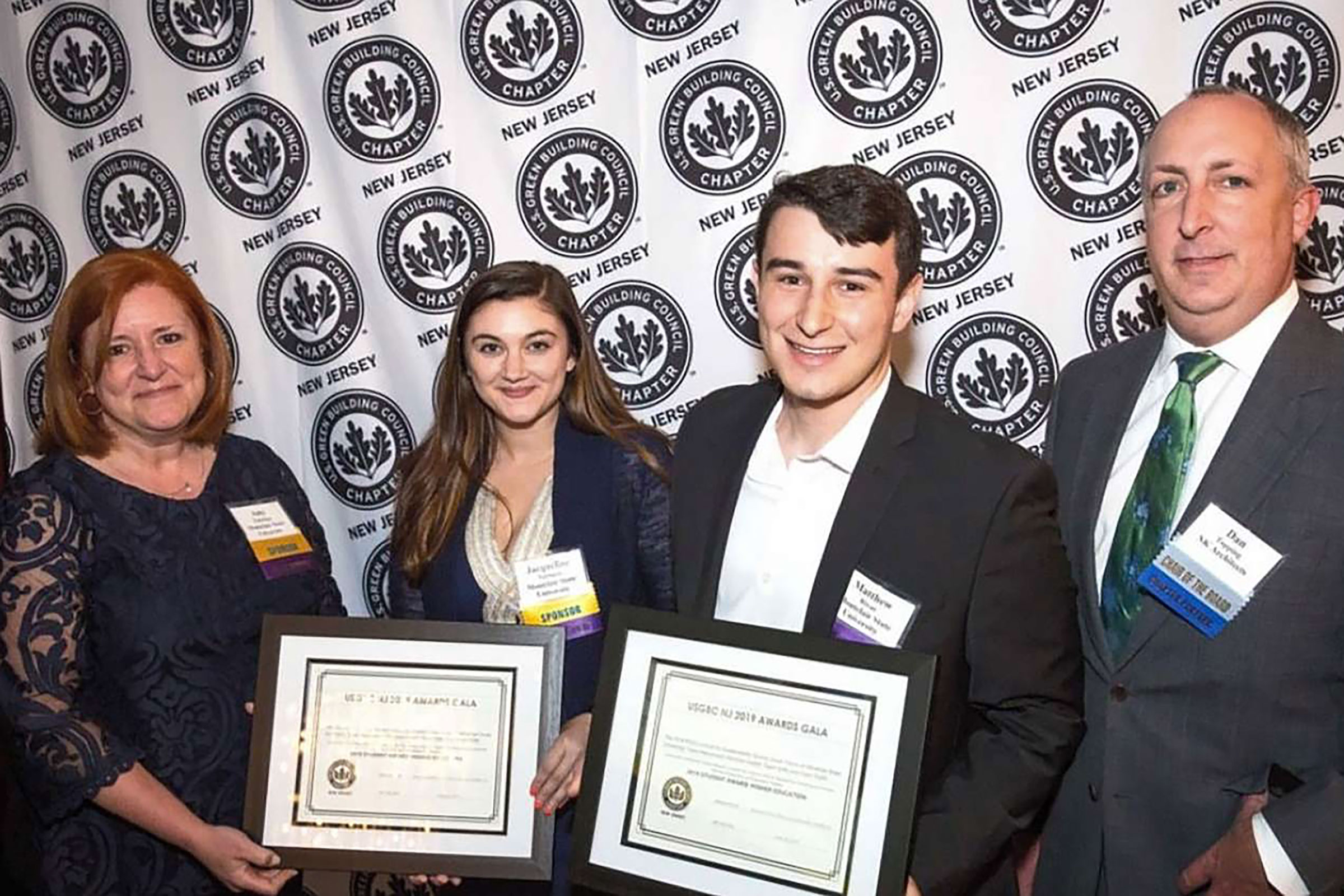 Director and students with Green Team rep receiving USGBC award