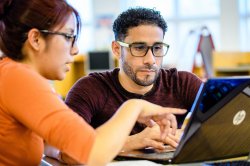 A student engages in a class project at Montclair State University.