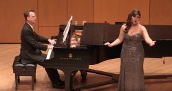 John J. Cali School of Music alumna Mia Pafumi, soprano, performing with pianist Steven W. Ryan, in Leshowitz Hall, in January 2013.