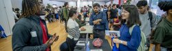 photo of people talking at job fair event