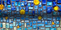 Mosaic depicting blue sky and multiple suns