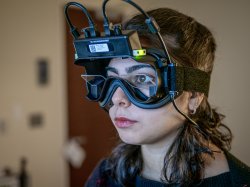 Student and faculty using Communication Sciences and Disorders equipment