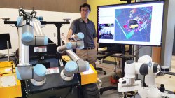 Dr. Weitian Wang in the Robotics Lab