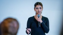 Charvi Parashar presenting at the Science Slam
