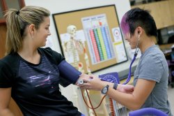 Two students use the Community Fitness Lab