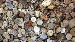 Photo of destroyed vintage clocks.