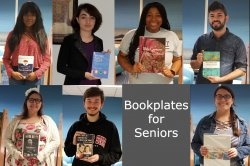 graduating library student assistants holding book of choice