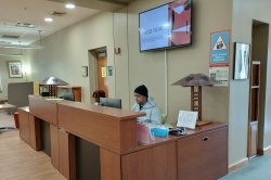 bloomfield college library front desk with 2 student workers