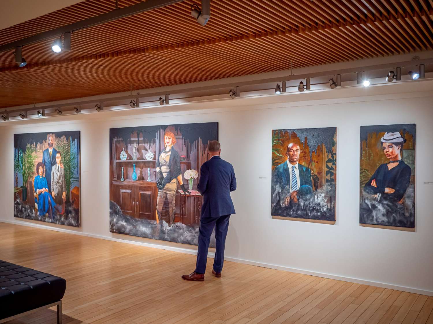 An attendee walking in the gallery