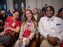 Students attend a budget hearing.
