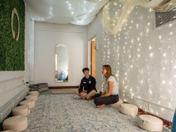 Donna Scro Samori, wellness coordinator for the Department of Theatre and Dance, and Artem Beliaviski relax together in the peaceful Zen Den space.