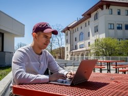 Montclair student working on laptop