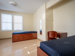 bedroom - two beds and a desk