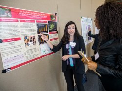 Mirna Halawani explains her research to one of the TechLaunch Awards judges, Ni'kita Wilson.