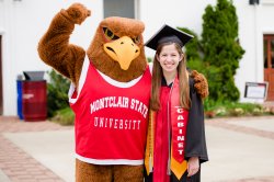The College of the Arts graduate (and Rocky the Red Hawk) at the 2016 College of the Arts Convocation.