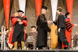 The College of the Arts Convocation stage, with Dean Gurskis and students, 2015.