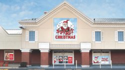 A brown and white two-story building with signs promoting a Christmas store.