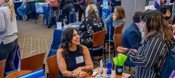 Picture of students and employers at a career fair.