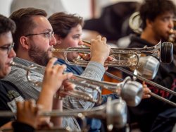 Gavin Ard rehearsing trumpet with Wind Symphony