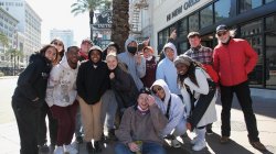 Steve McCarthy and group of students smiling for camera in New Orleans
