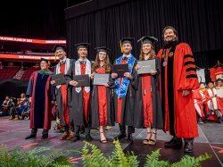 Povolo Quintuplets in Commencement with President Koppell