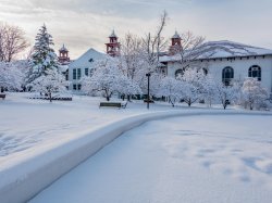 College Hall and surrounding campus area blanketed in snow.